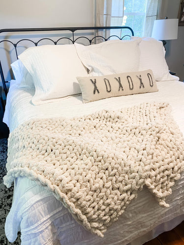 Ivory 3x5 on a King size bed